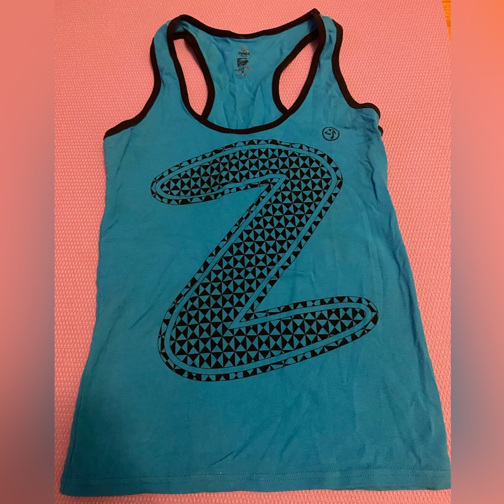 Blue medium Zumba racerback shirt.